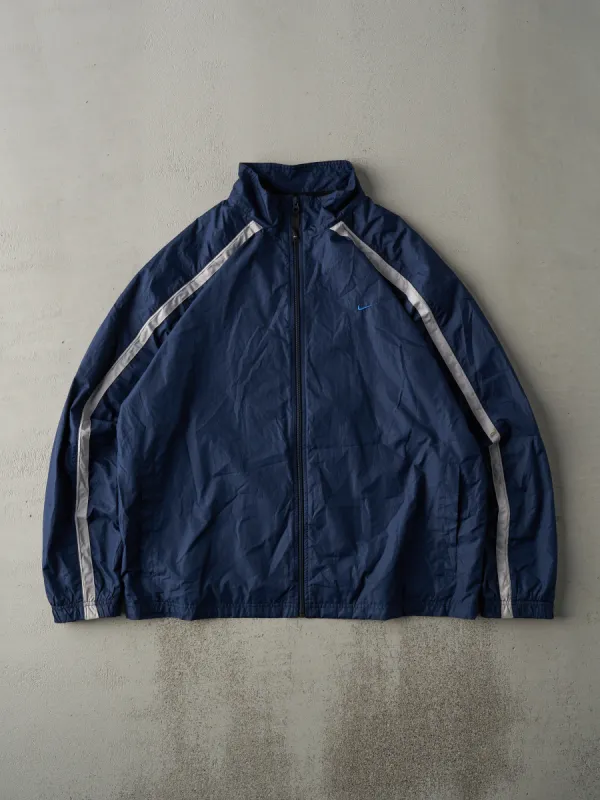 Vintage Y2K Navy Blue Reflective Stripe Nike Embroidered Windbreaker Jacket (L) sold by Rebalance Vintage