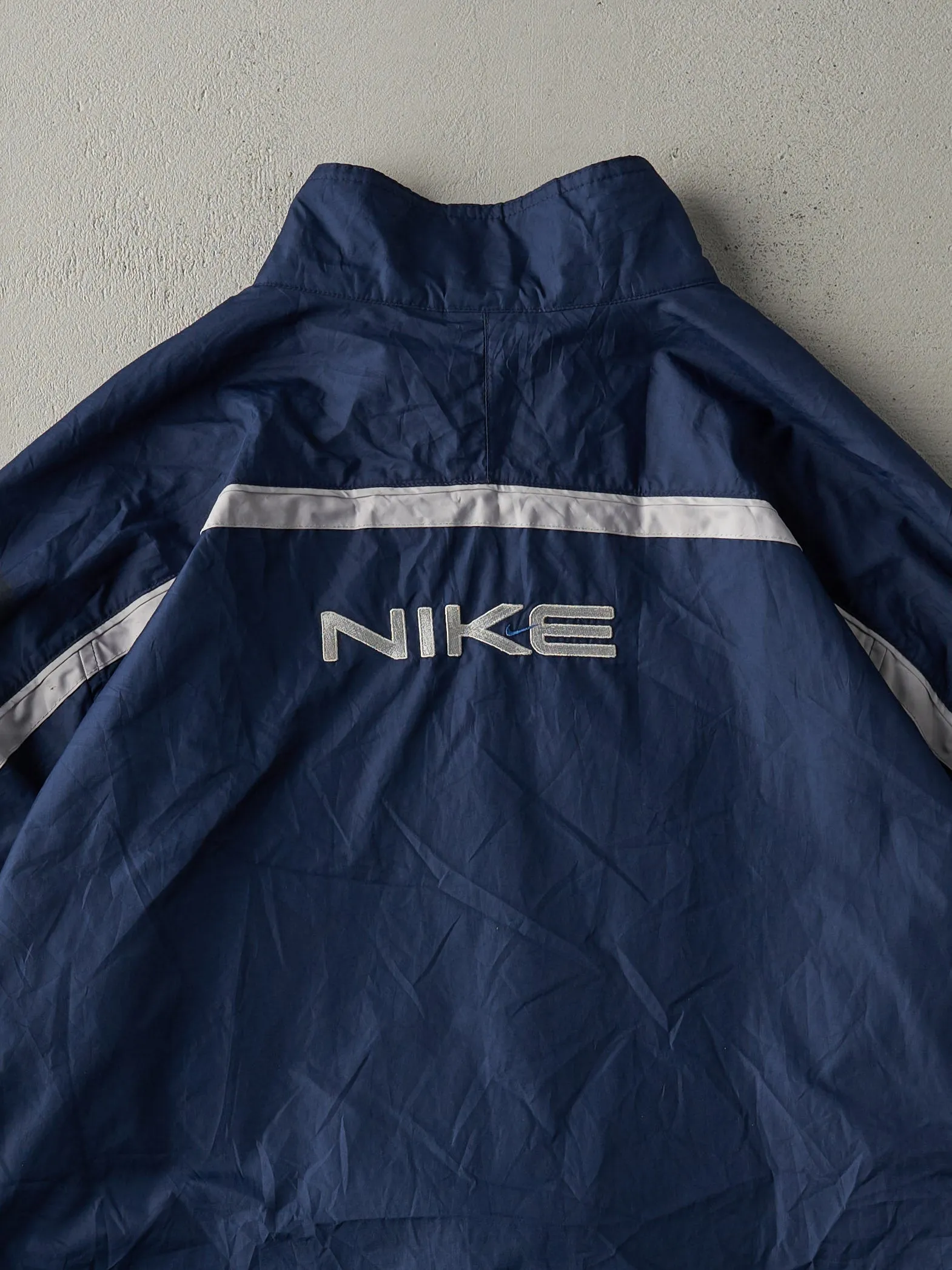 Vintage Y2K Navy Blue Reflective Stripe Nike Embroidered Windbreaker Jacket (L) sold by Rebalance Vintage product image thumbnail 4