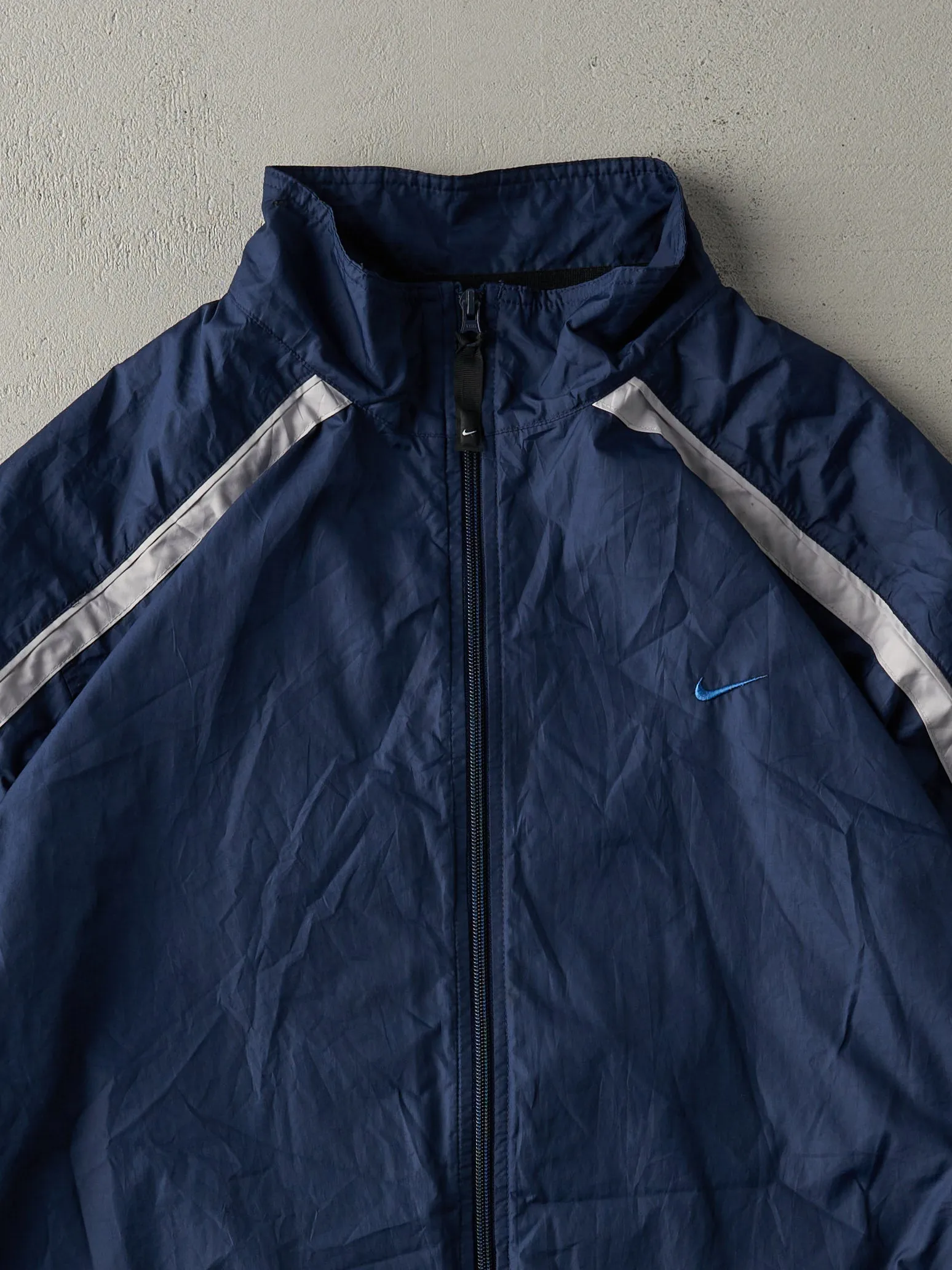 Vintage Y2K Navy Blue Reflective Stripe Nike Embroidered Windbreaker Jacket (L) sold by Rebalance Vintage product image thumbnail 3
