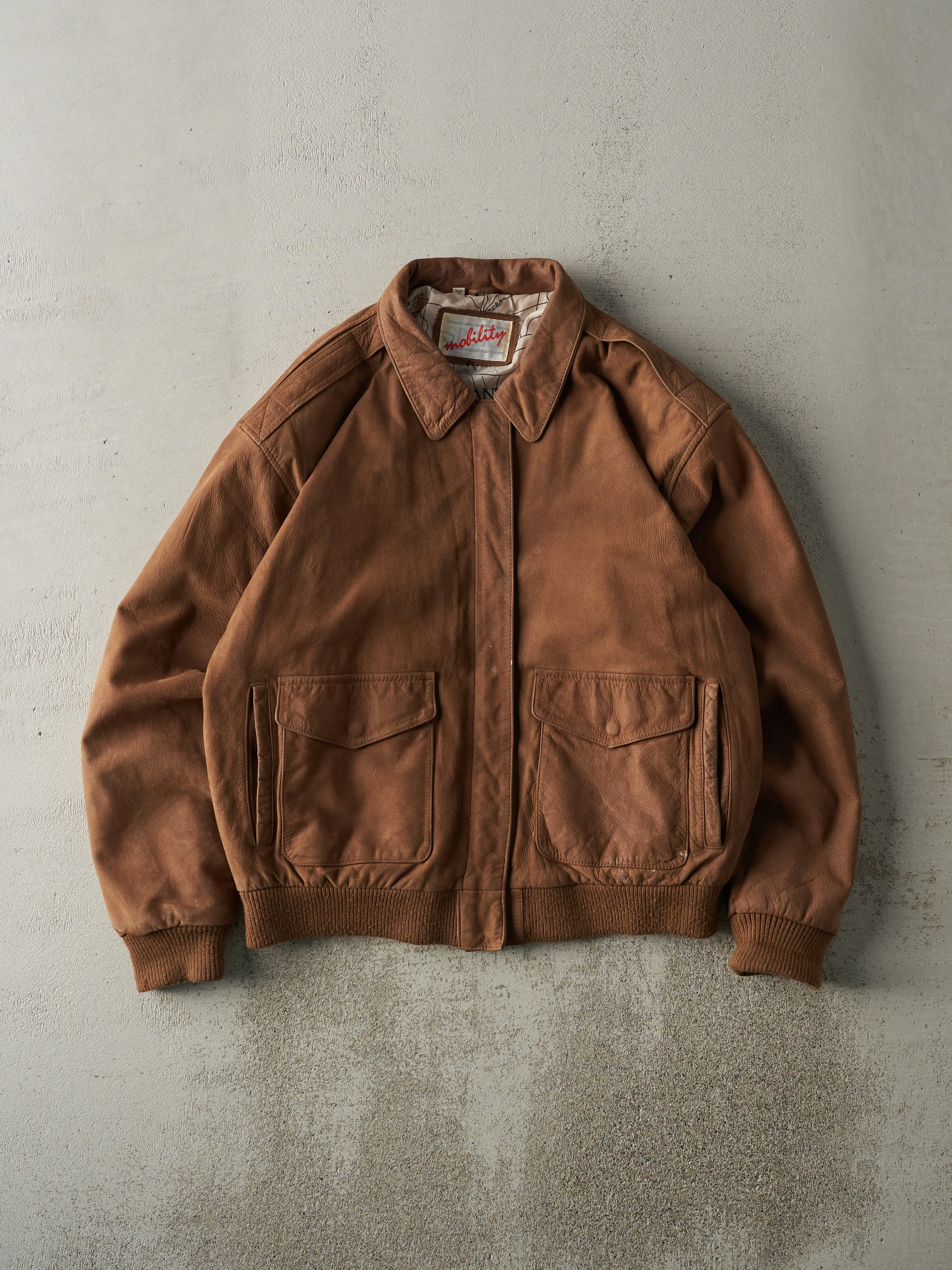 Vintage 90s Brown Sport Mobility Suede Leather Jacket (L) sold by Rebalance Vintage
