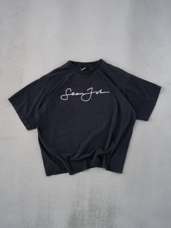Vintage 90s Washed Black Sean John Signature Tee (L) sold by Rebalance Vintage