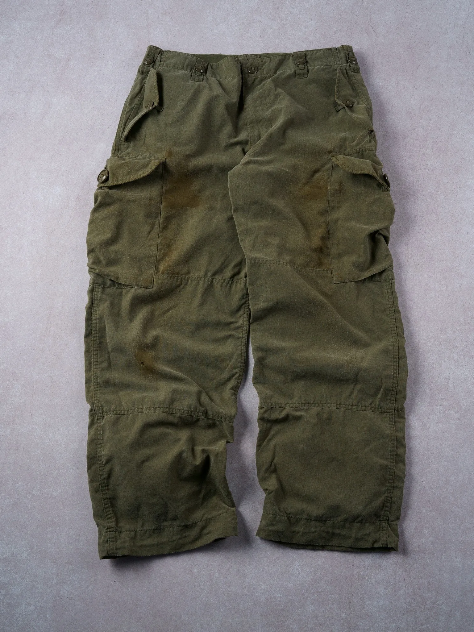 Vintage 90s Army Green Parachute Cargo Pants (32x28) sold by Rebalance Vintage