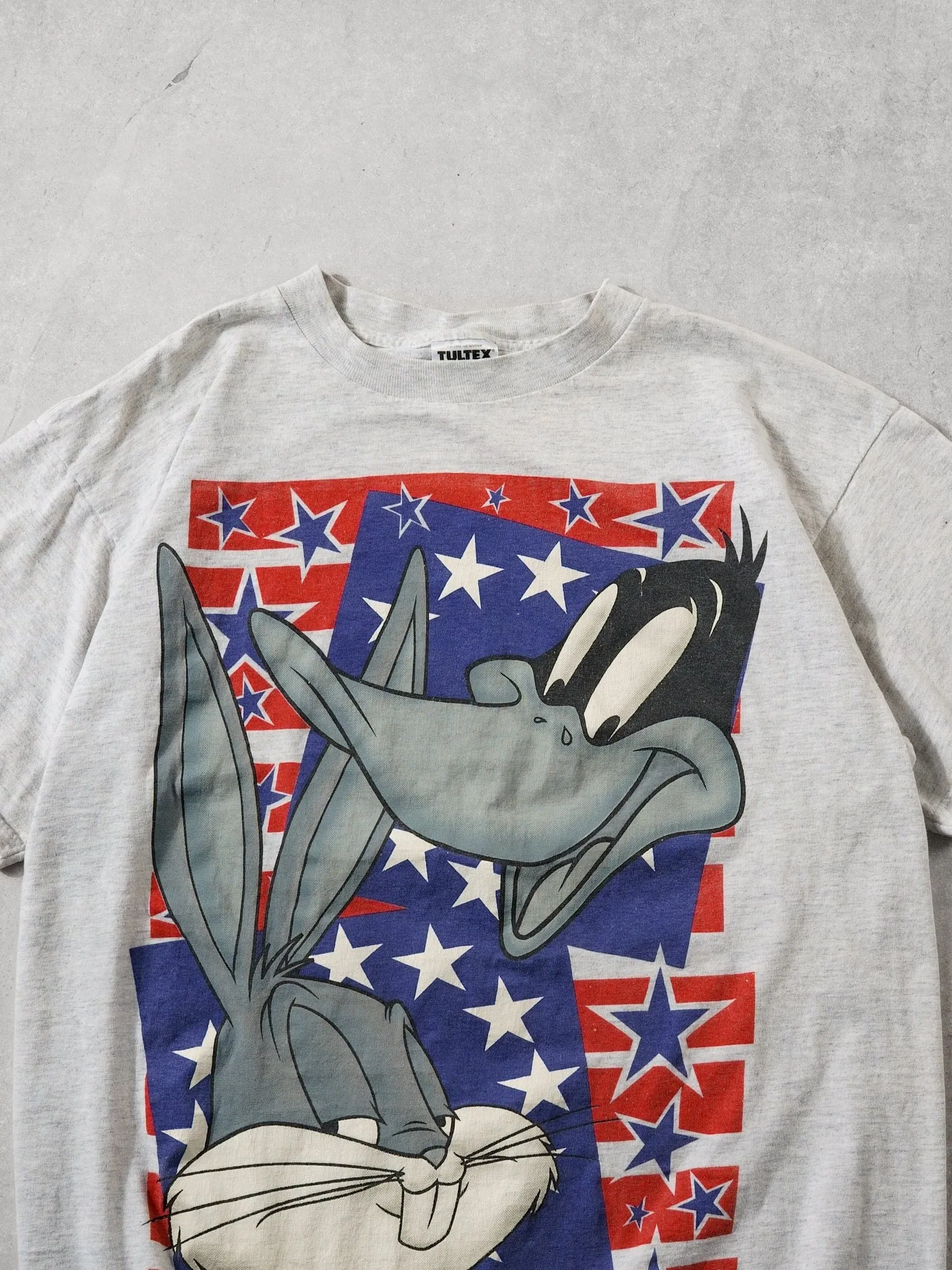 Vintage 95' Grey Bugs Bunny and Daffy Duck Stars Tee (L) sold by Rebalance Vintage product image thumbnail 2