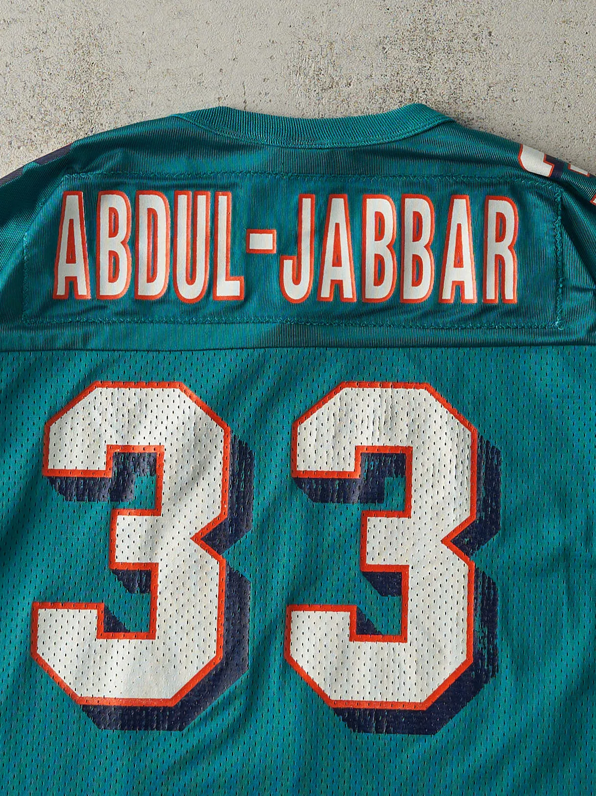 Vintage 90s Teal Miami Dolphins #33 Karim Abdul-Jabbar Cropped Football Jersey (L) sold by Rebalance Vintage product image thumbnail 4