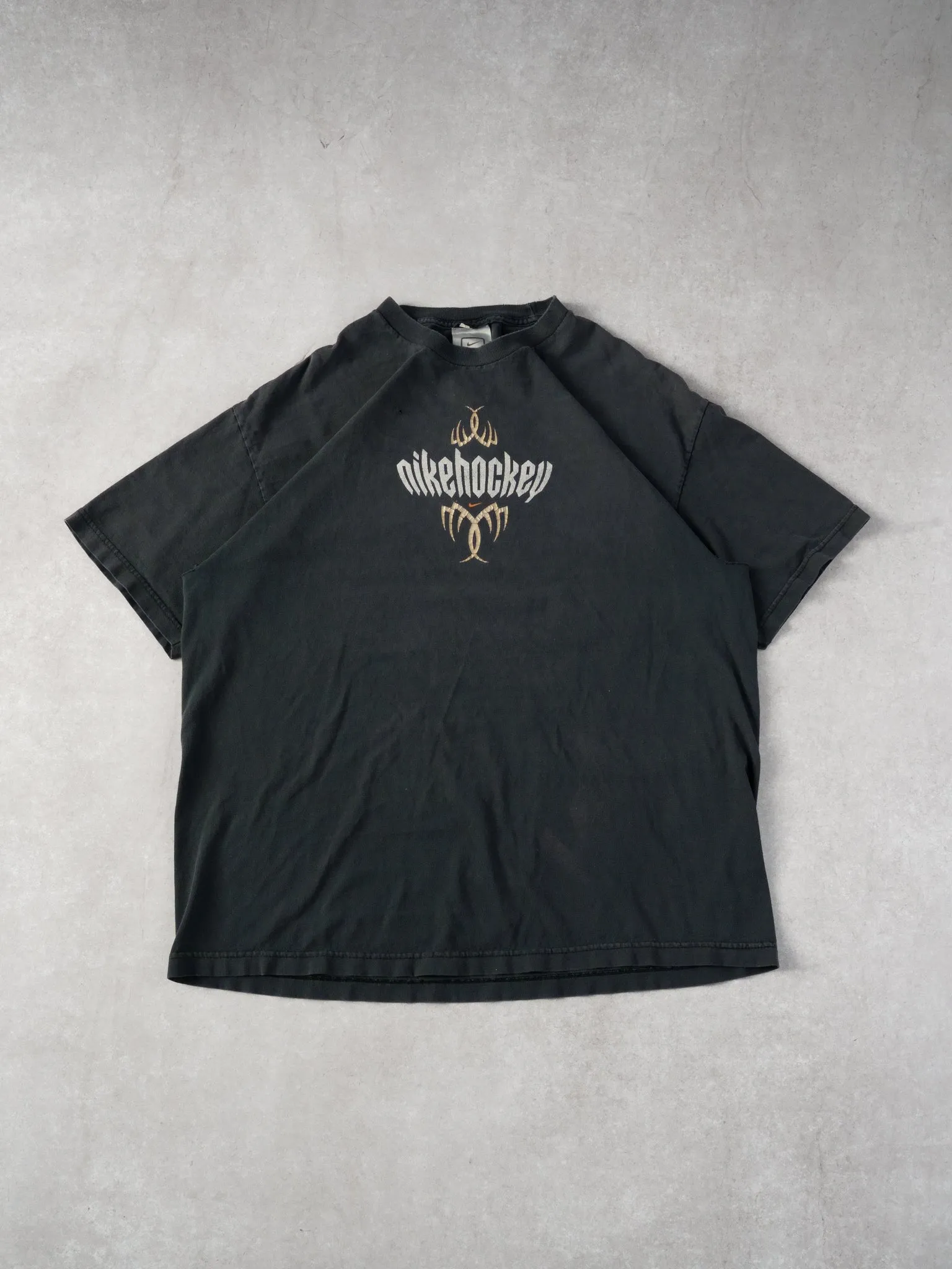 Vintage Y2k Washed Black Nike Hockey Emblem Tee (L) sold by Rebalance Vintage