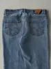 Vintage 80s Light Wash Levi's Orange Tab Released Hem Jeans (34x29) sold by Rebalance Vintage
