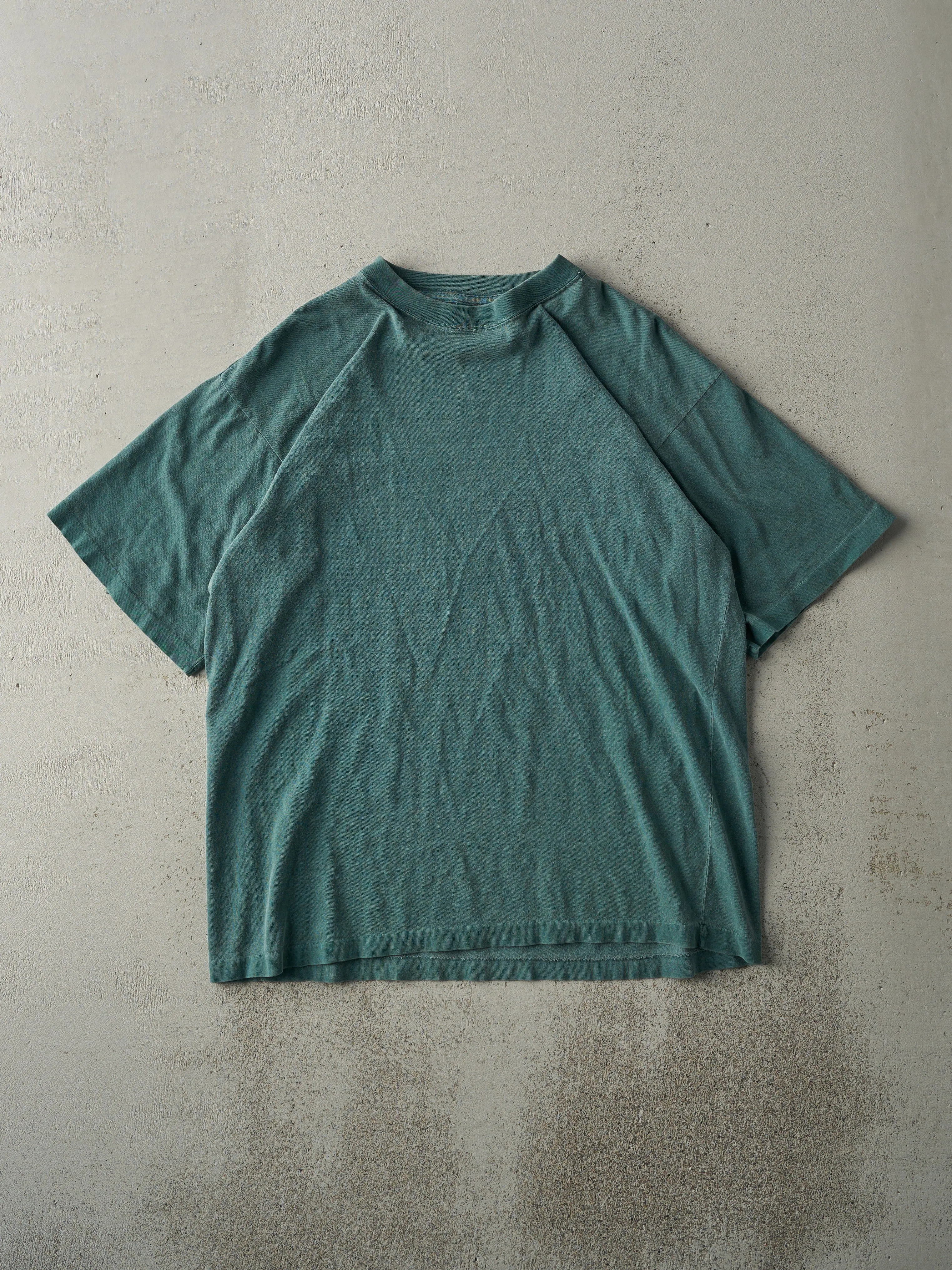 Vintage 90s Washed Green Blank Tee (M) sold by Rebalance Vintage