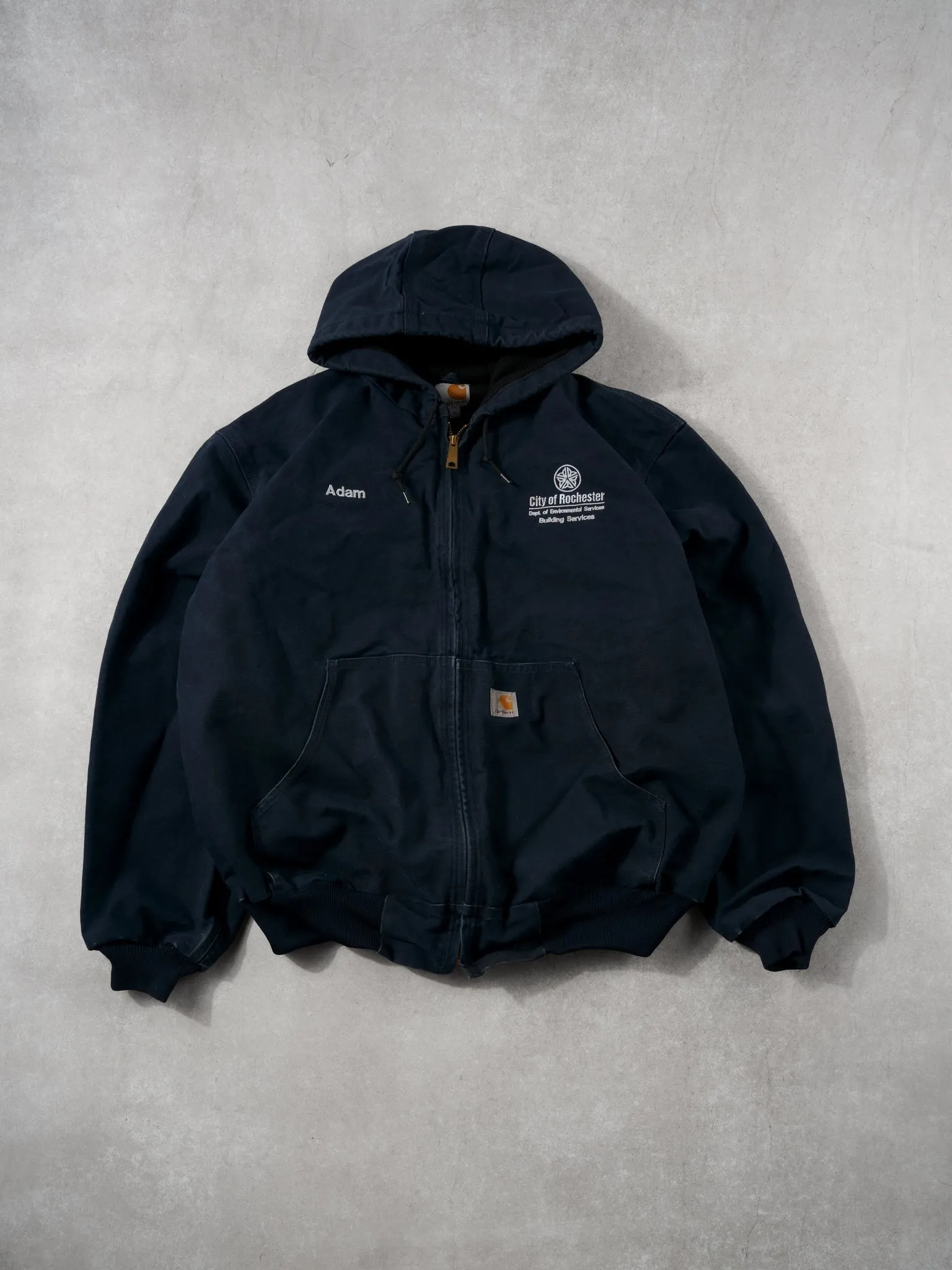 Vintage 90s Navy Blue City Of Rochester Environment Carhartt Workwear Hooded Jacket (L/XL) sold by Rebalance Vintage