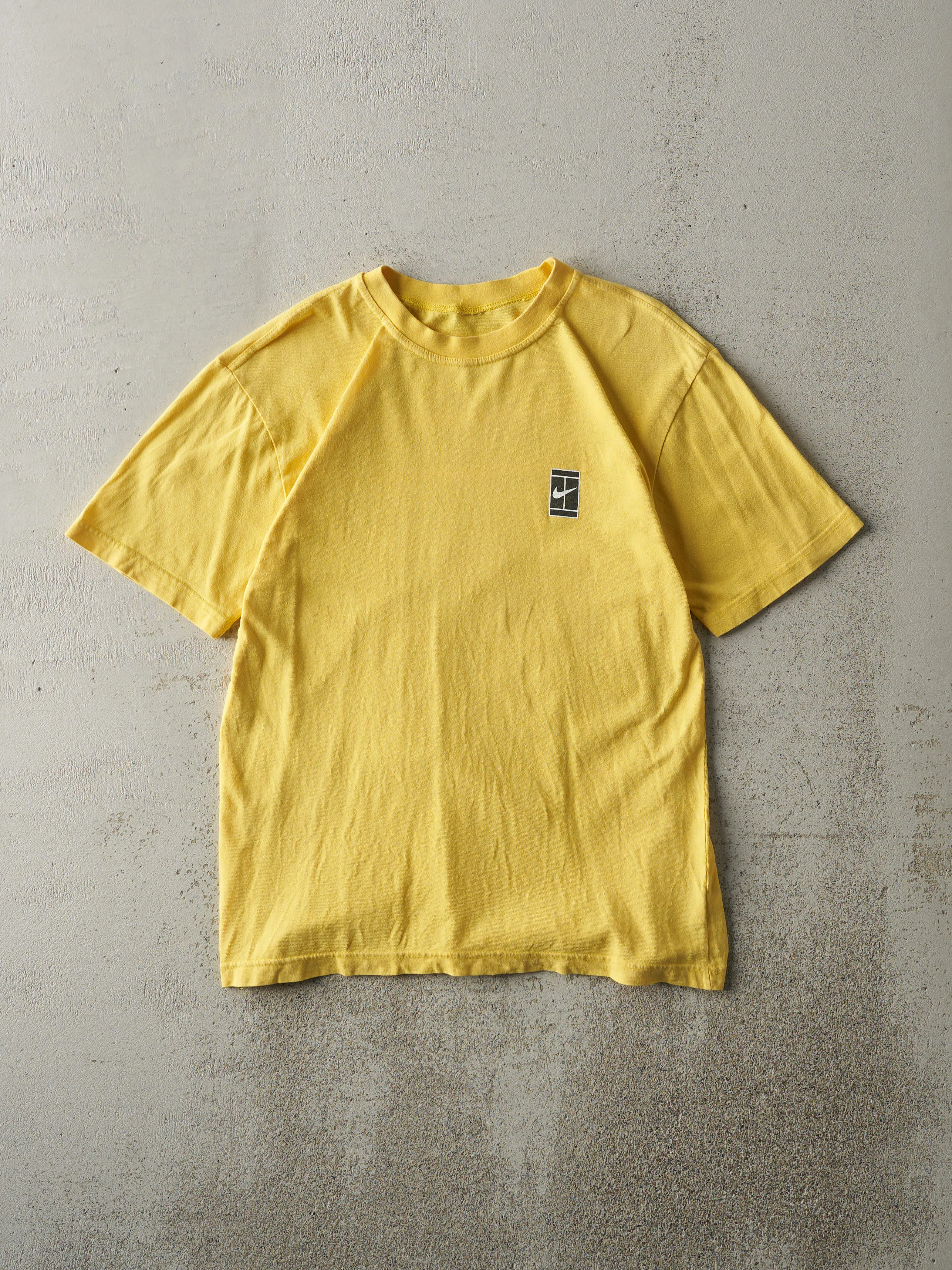 Vintage Y2K Yellow Nike Tennis Tee (S) sold by Rebalance Vintage