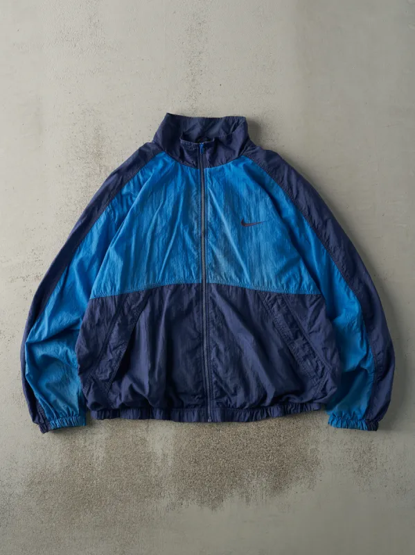 Vintage 90s Navy Blue Nike Windbreaker Jacket (XL) sold by Rebalance Vintage