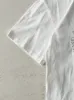 Vintage Y2K White Bootleg Embroidered Chanel Tee (S) sold by Rebalance Vintage