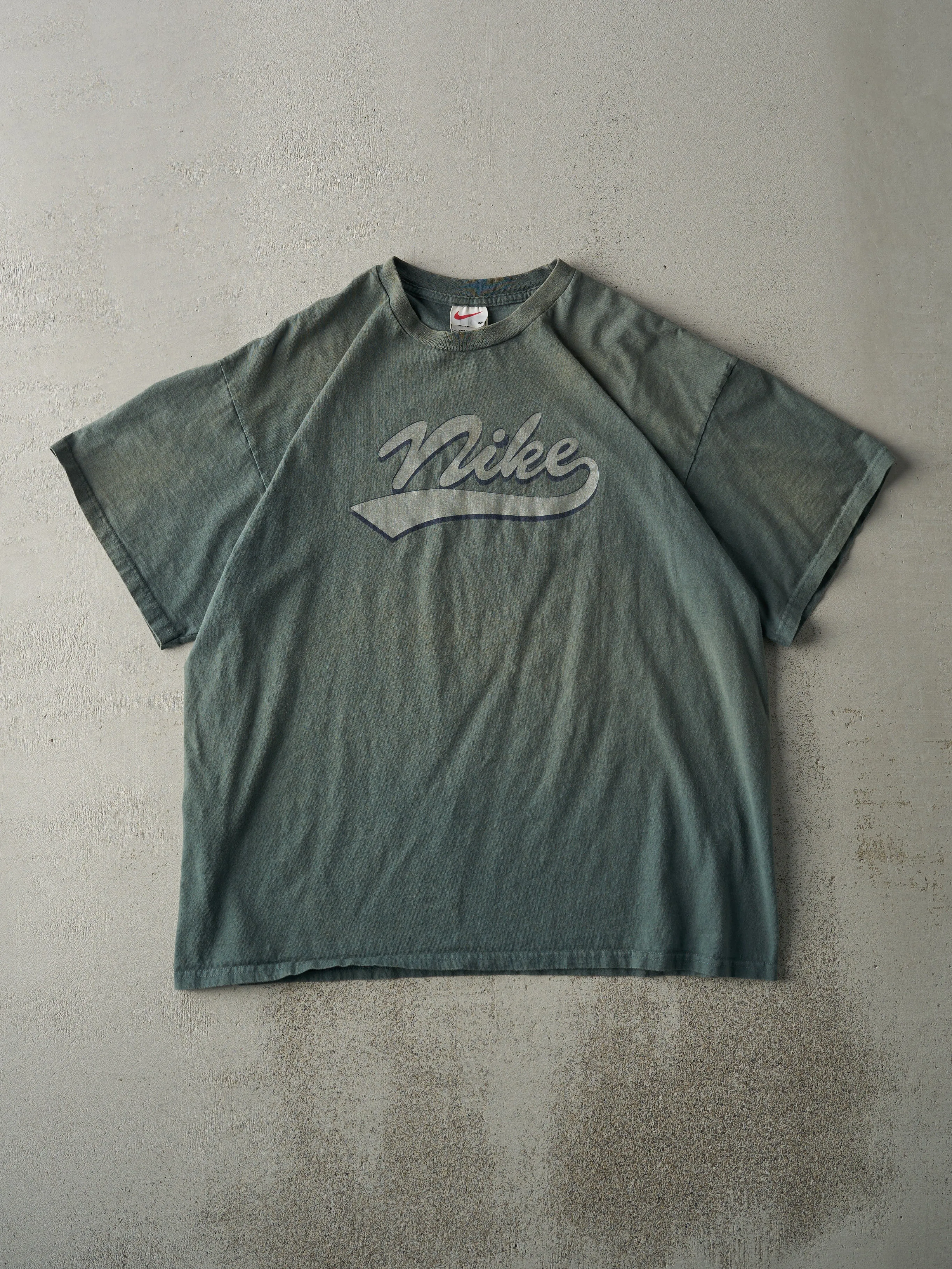 Vintage 90s Washed Green Nike Logo Tee (L) sold by Rebalance Vintage