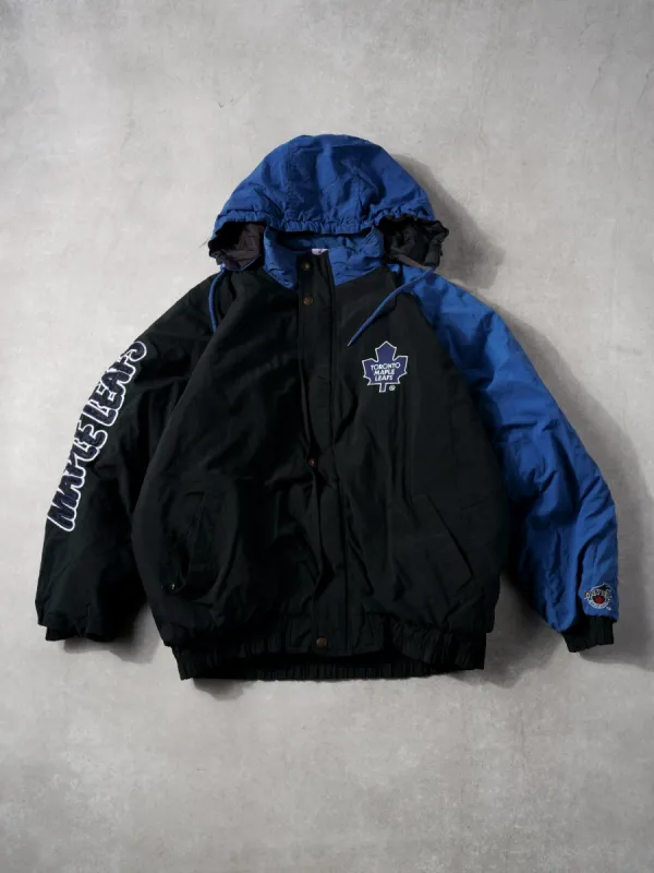 Vintage 90s Blue and Black Toronto Maple Leafs Hooded Jacket (XL) sold by Rebalance Vintage