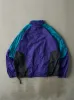Vintage 80s Teal, Purple & Black Nike Windbreaker Jacket (M) sold by Rebalance Vintage