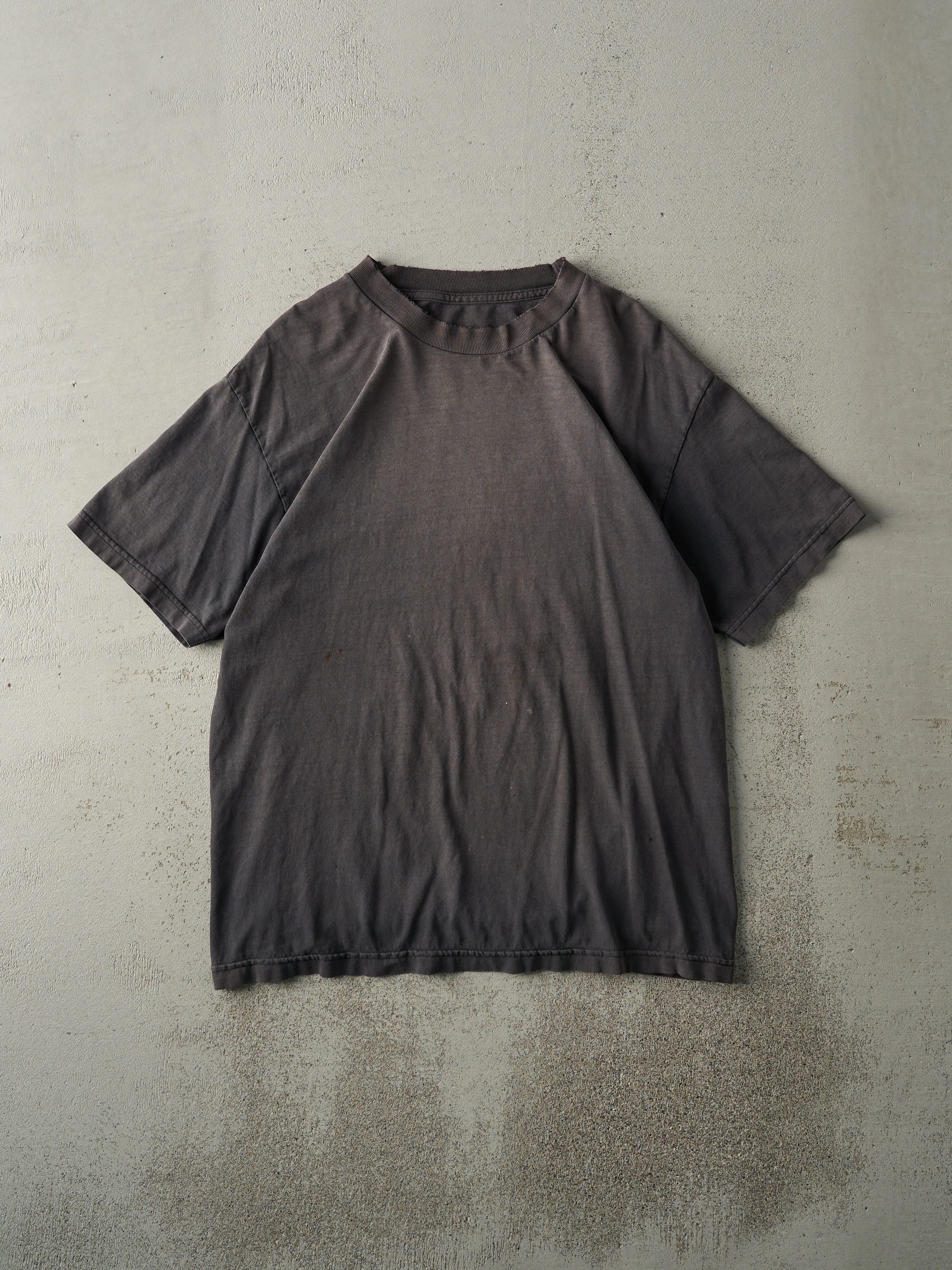 Vintage 90s Sun Faded Black Blank Tee (M) sold by Rebalance Vintage