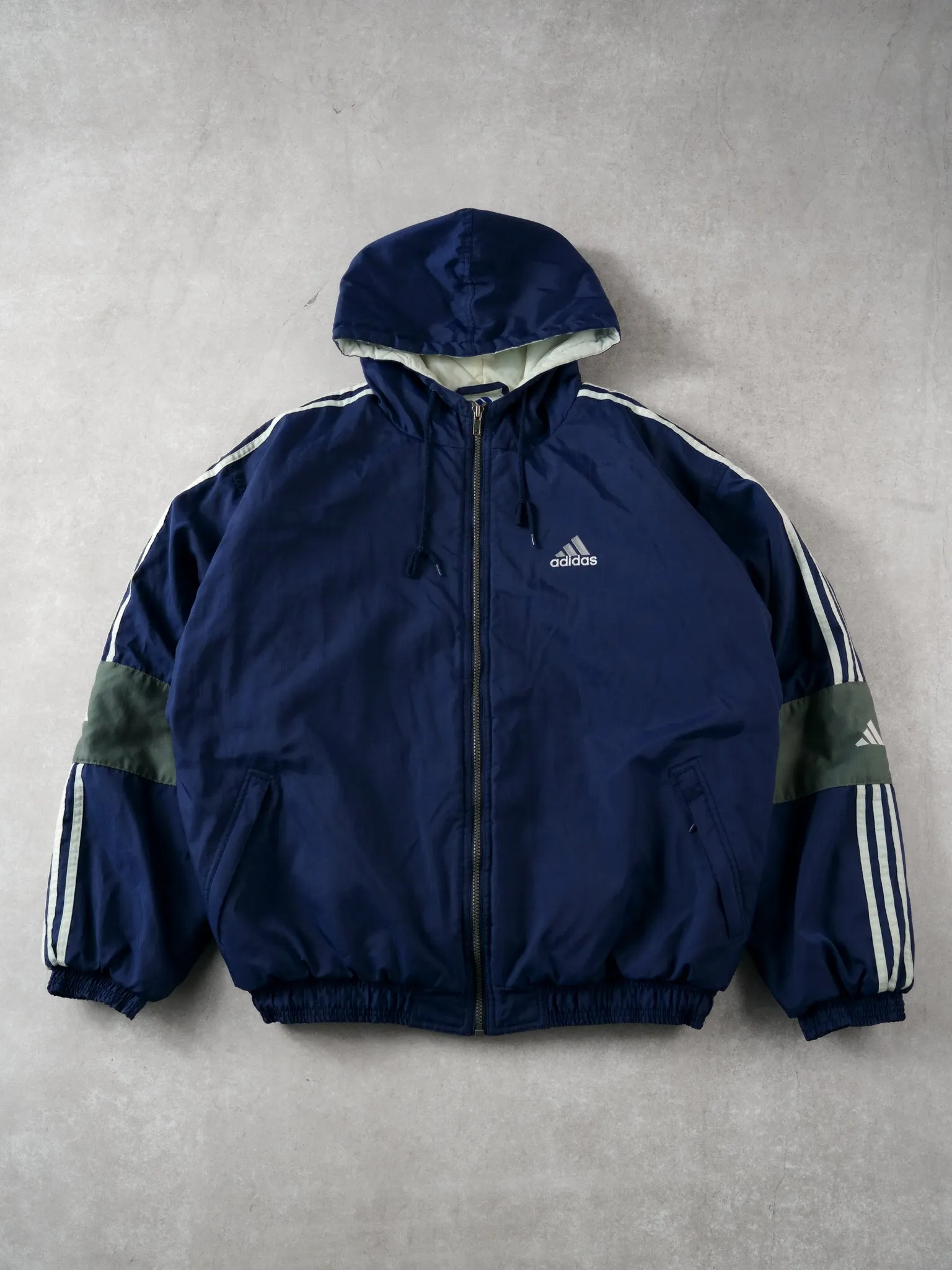 Vintage 90s Navy Blue Adidas Hooded Windbreaker (L) sold by Rebalance Vintage