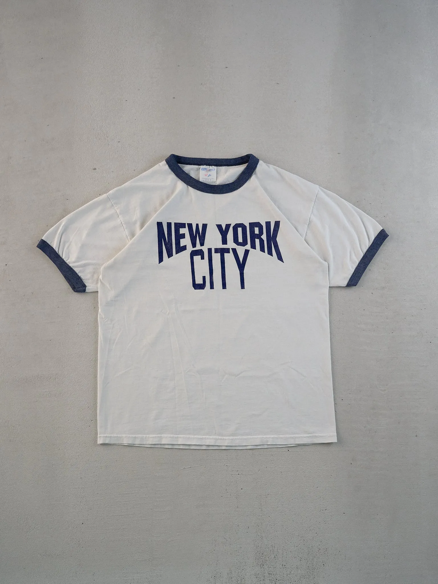 Vintage 90s White and Blue New York City John Lennon Tee (M) sold by Rebalance Vintage