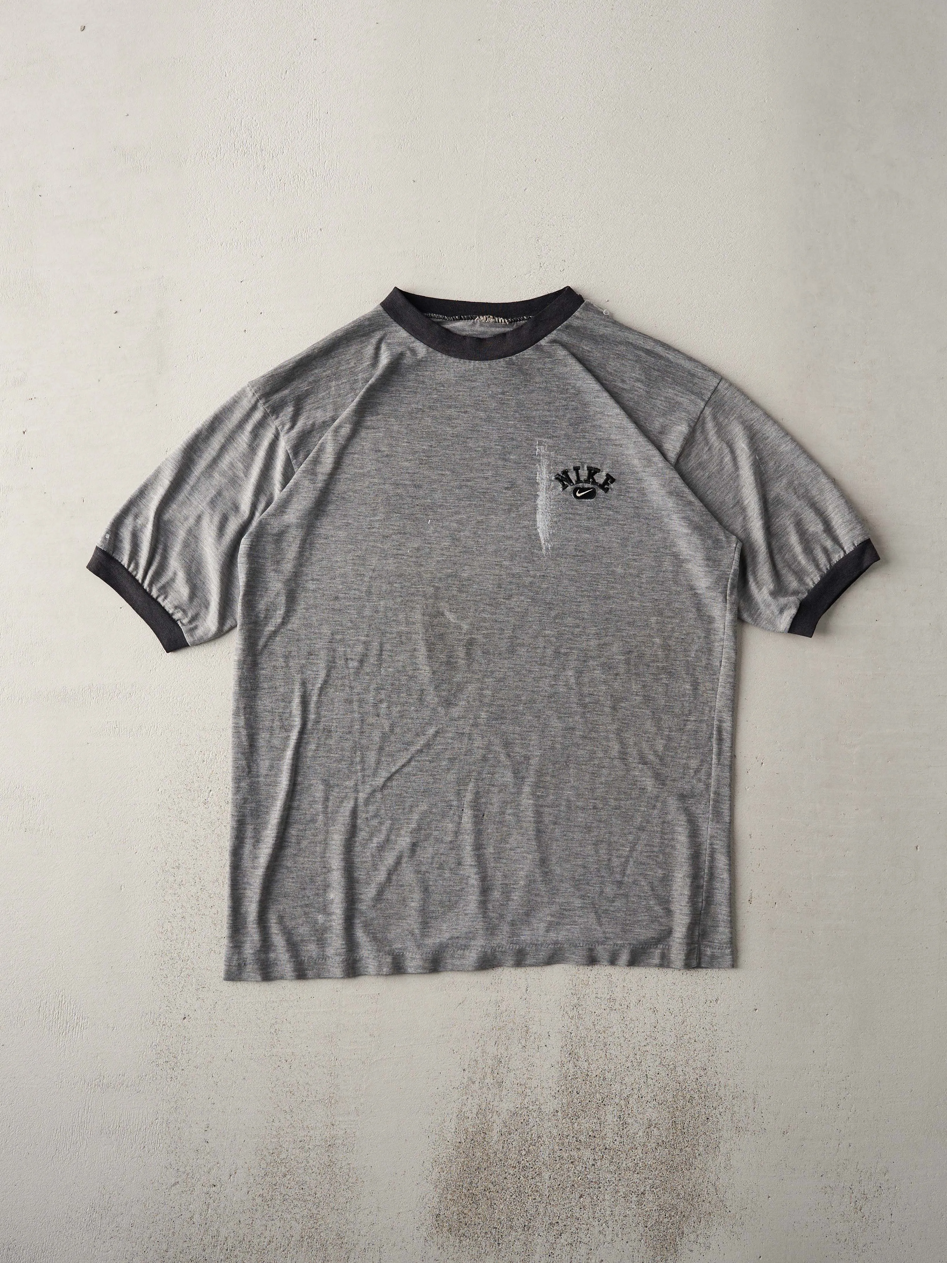 Vintage 90s Washed Grey Nike Ringer Tee (M) sold by Rebalance Vintage