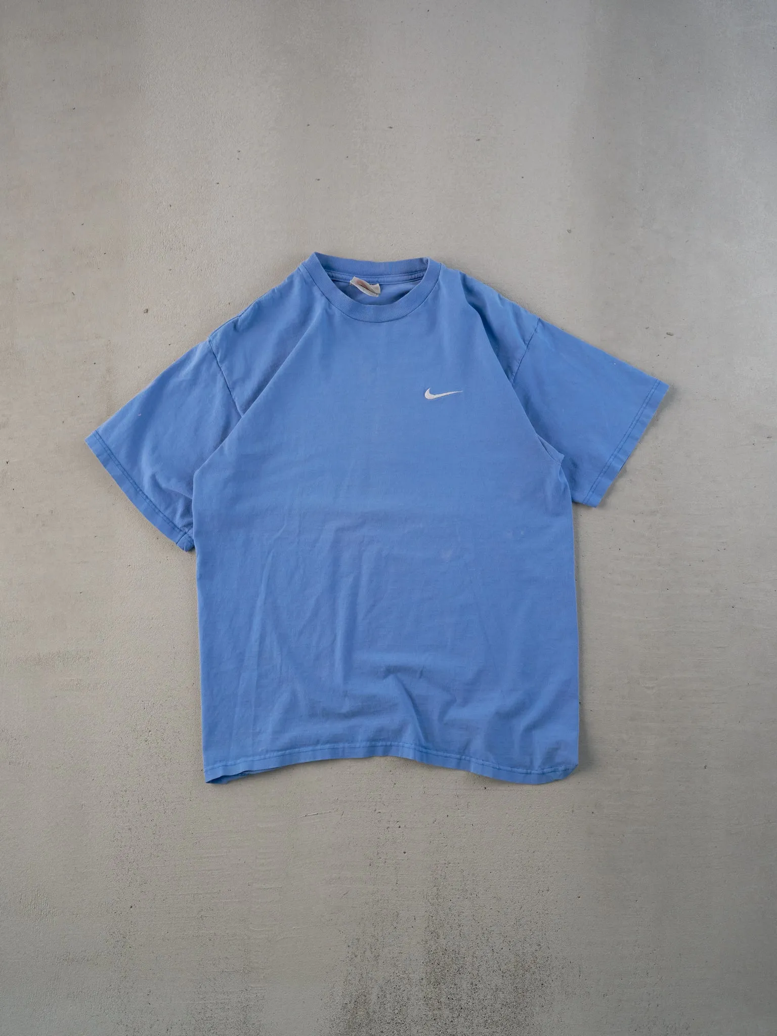 Vintage 90s Powder Blue Nike small Swosh Blank Tee (S) sold by Rebalance Vintage