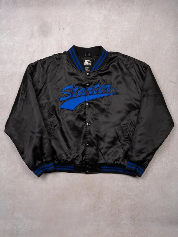 Vintage 90s Black + Blue Starter Satin Bomber Jacket (XL) sold by Rebalance Vintage
