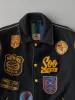 Vintage 70s Black BUMBACO'S Sports Center Patchwork Wool Jacket (S/M) sold by Rebalance Vintage