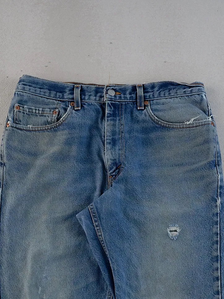 Vintage 90s Blue Levi's 550 Denim Jeans (33x32) sold by Rebalance Vintage product image thumbnail 2