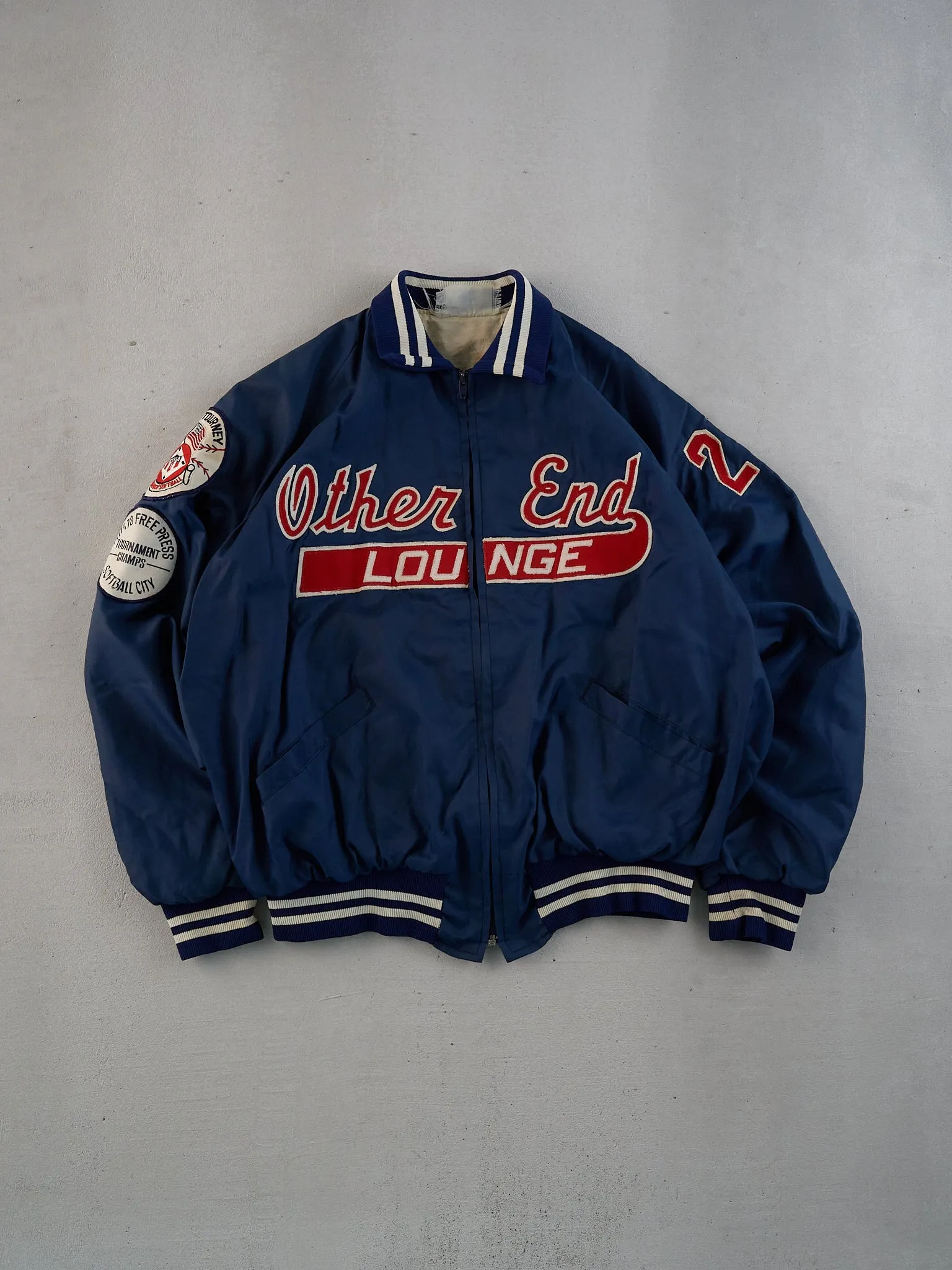 Vintage 70s Navy Blue Other End Lounge Satin Bomber Jacket (L/XL) sold by Rebalance Vintage