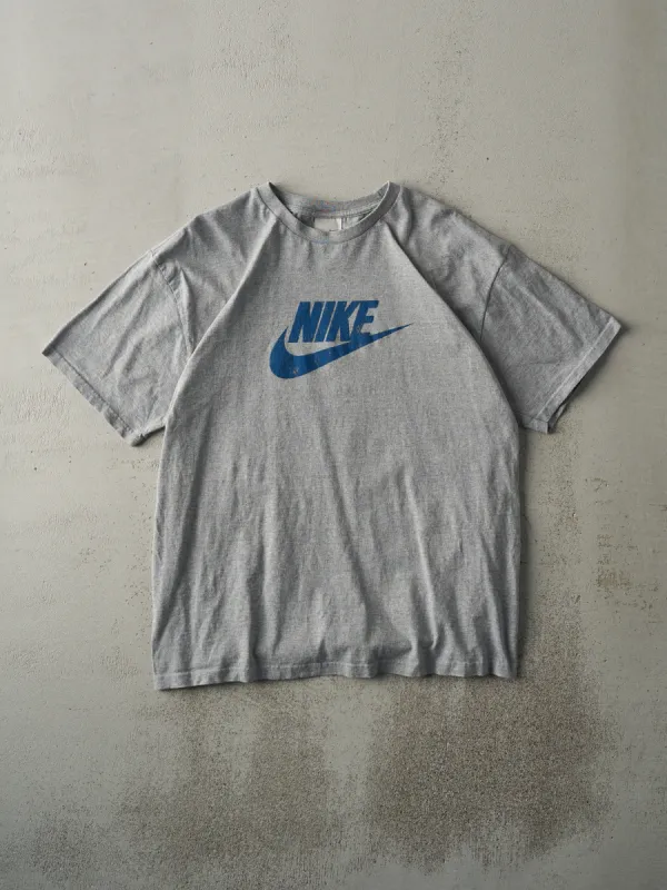 Vintage Y2K Grey Nike Logo Tee (M/L) sold by Rebalance Vintage