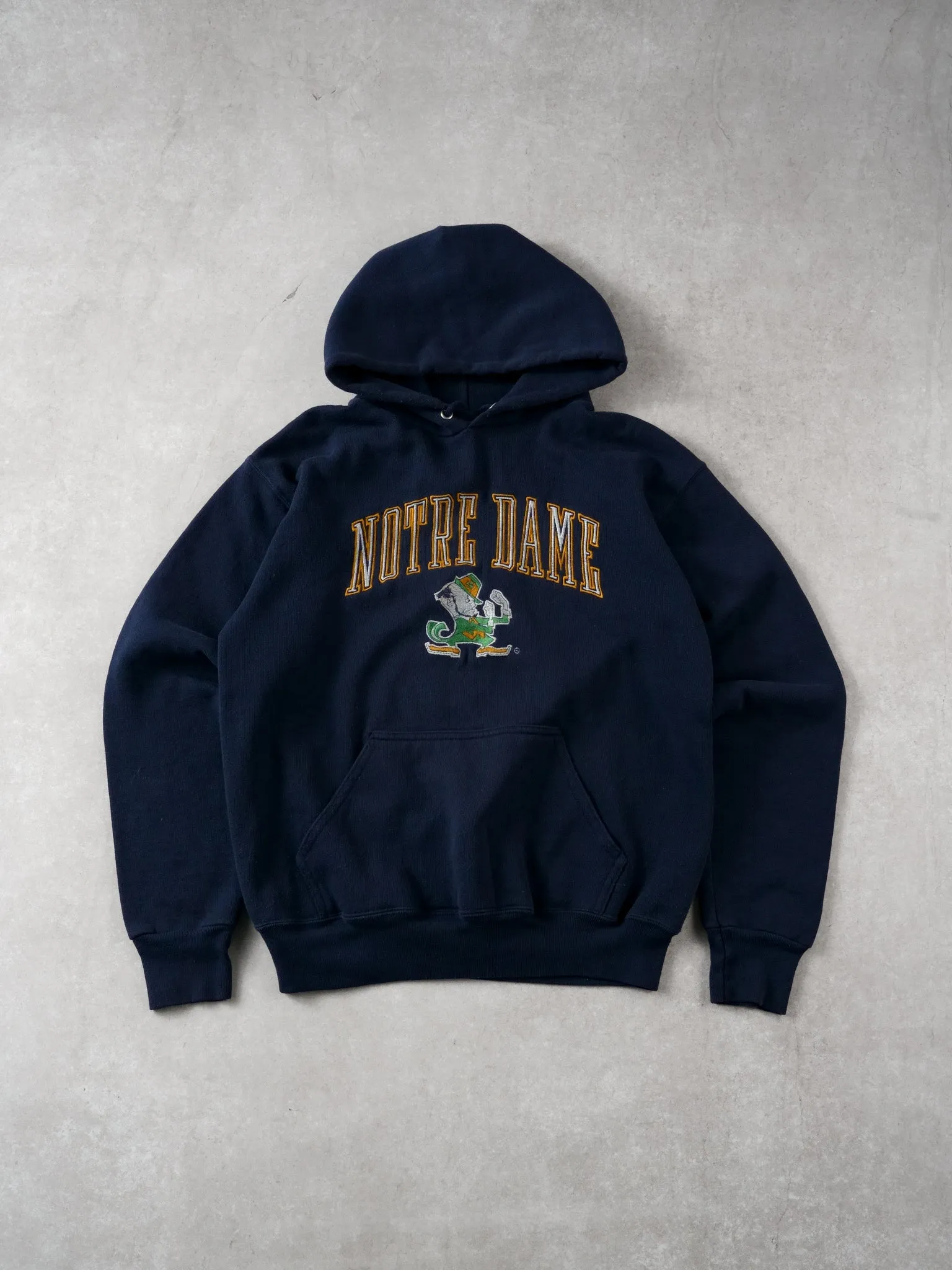 Vintage 90s Navy Blue Notre Dame Hoodie (M) sold by Rebalance Vintage
