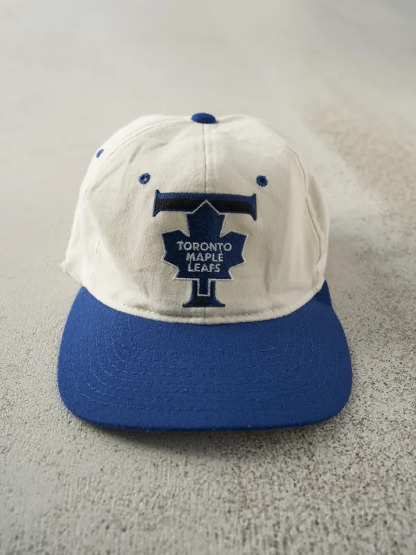 Vintage 90s Beige & Blue Toronto Maple Leafs Fitted Hat (7 1/8) sold by Rebalance Vintage