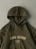 Vintage Y2K Green Embroidered Land Rover Hoodie (L) sold by Rebalance Vintage