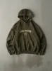Vintage Y2K Green Embroidered Land Rover Hoodie (L) sold by Rebalance Vintage