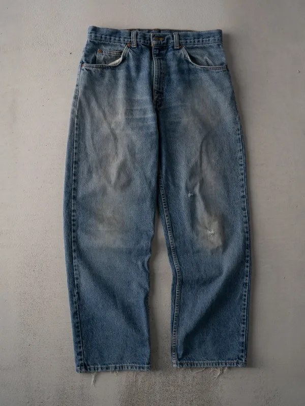 Vintage 70s Blue Distressed Levi Denim Jeans (32 x 30) sold by Rebalance Vintage