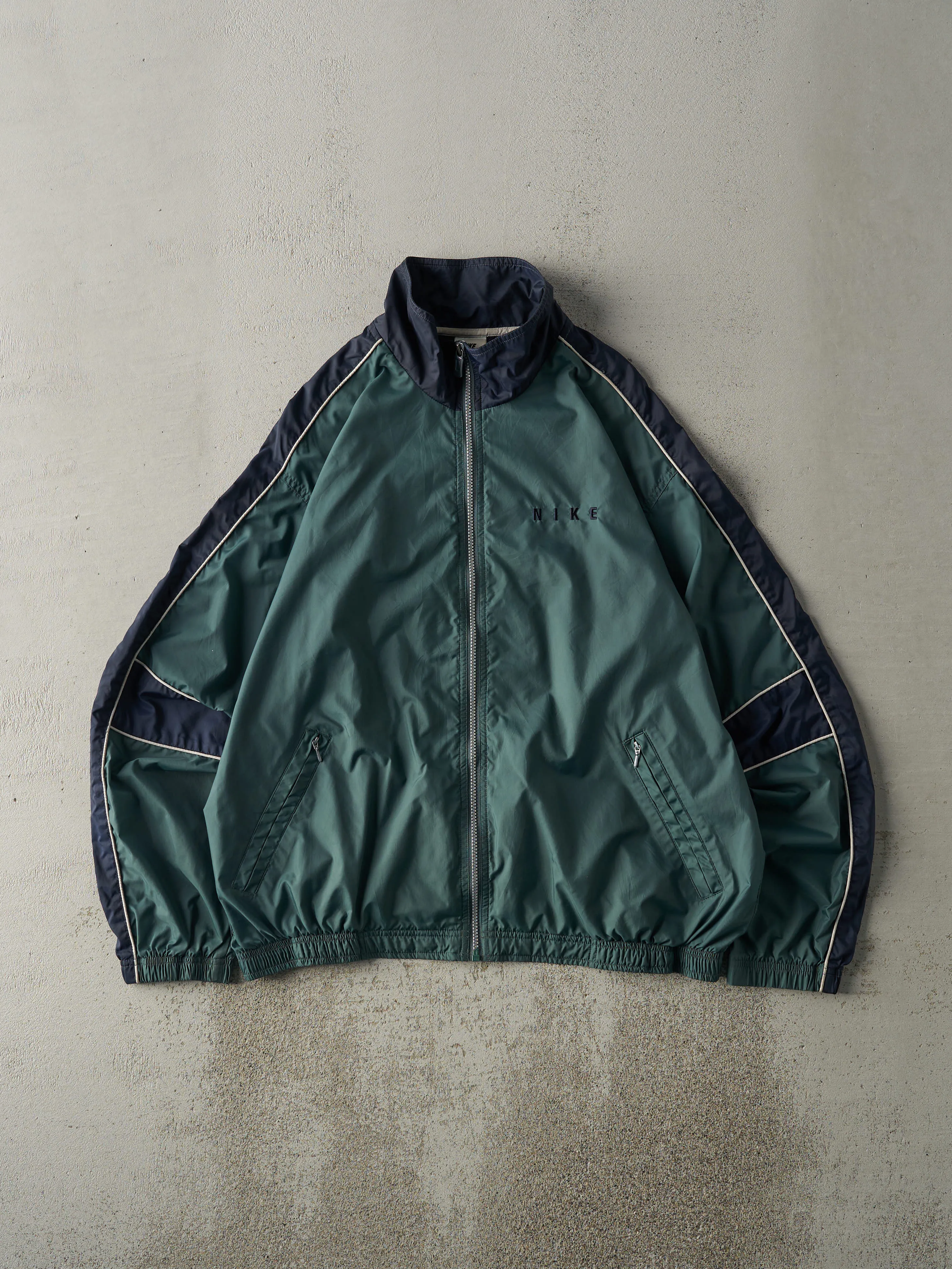 Vintage 90s Green & Navy Nike Zip Up Windbreaker Jacket (L) sold by Rebalance Vintage