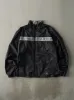Vintage Y2K Black & Silver Reflective Adidas Windbreaker Jacket (S/M) sold by Rebalance Vintage