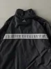 Vintage Y2K Black & Silver Reflective Adidas Windbreaker Jacket (S/M) sold by Rebalance Vintage
