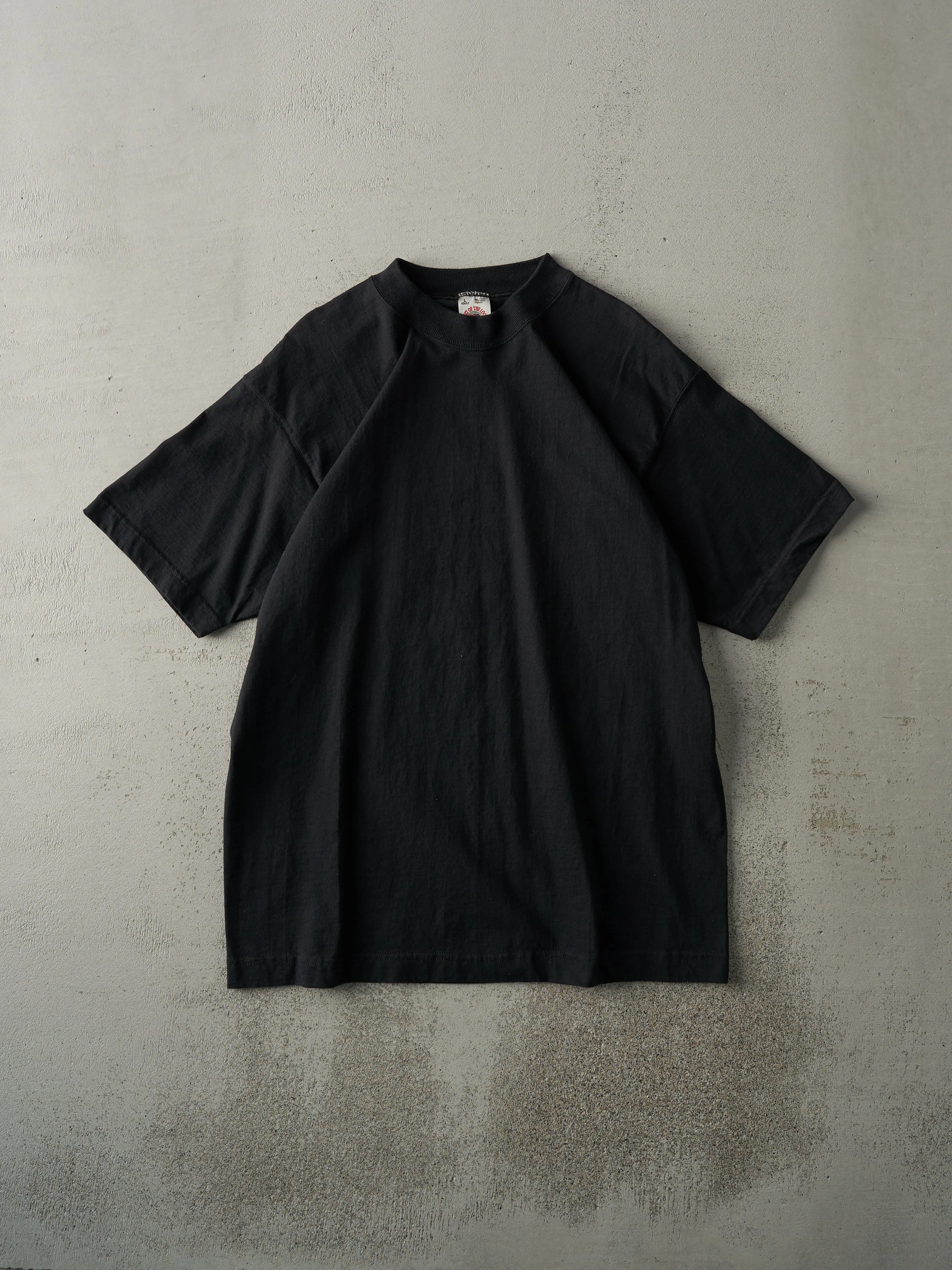Vintage 90s Black Blank Tee (M/L) sold by Rebalance Vintage