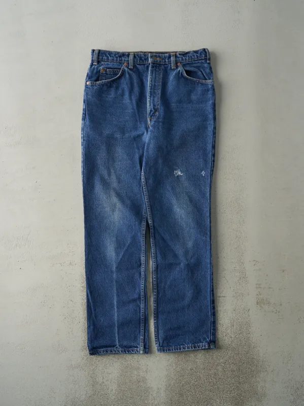 Vintage 80s Mid Wash Levi's 619 Orange Tab Jeans (33x30.5) sold by Rebalance Vintage