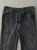 Vintage Y2K Faded Black Levi's 505 Denim Pants (35.5x30) sold by Rebalance Vintage