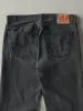 Vintage Y2K Faded Black Levi's 505 Denim Pants (35.5x30) sold by Rebalance Vintage