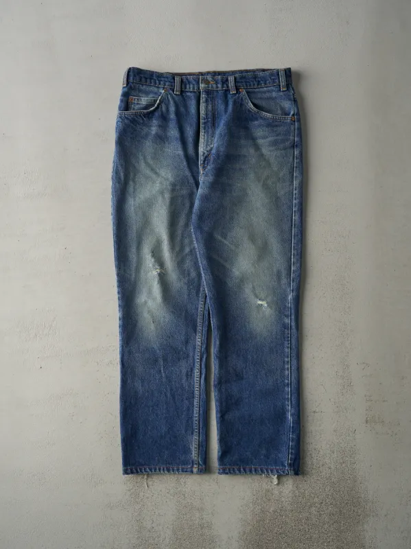 Vintage 80s Mid Wash Levi's 619 Orange Tab Jeans (34x28) sold by Rebalance Vintage
