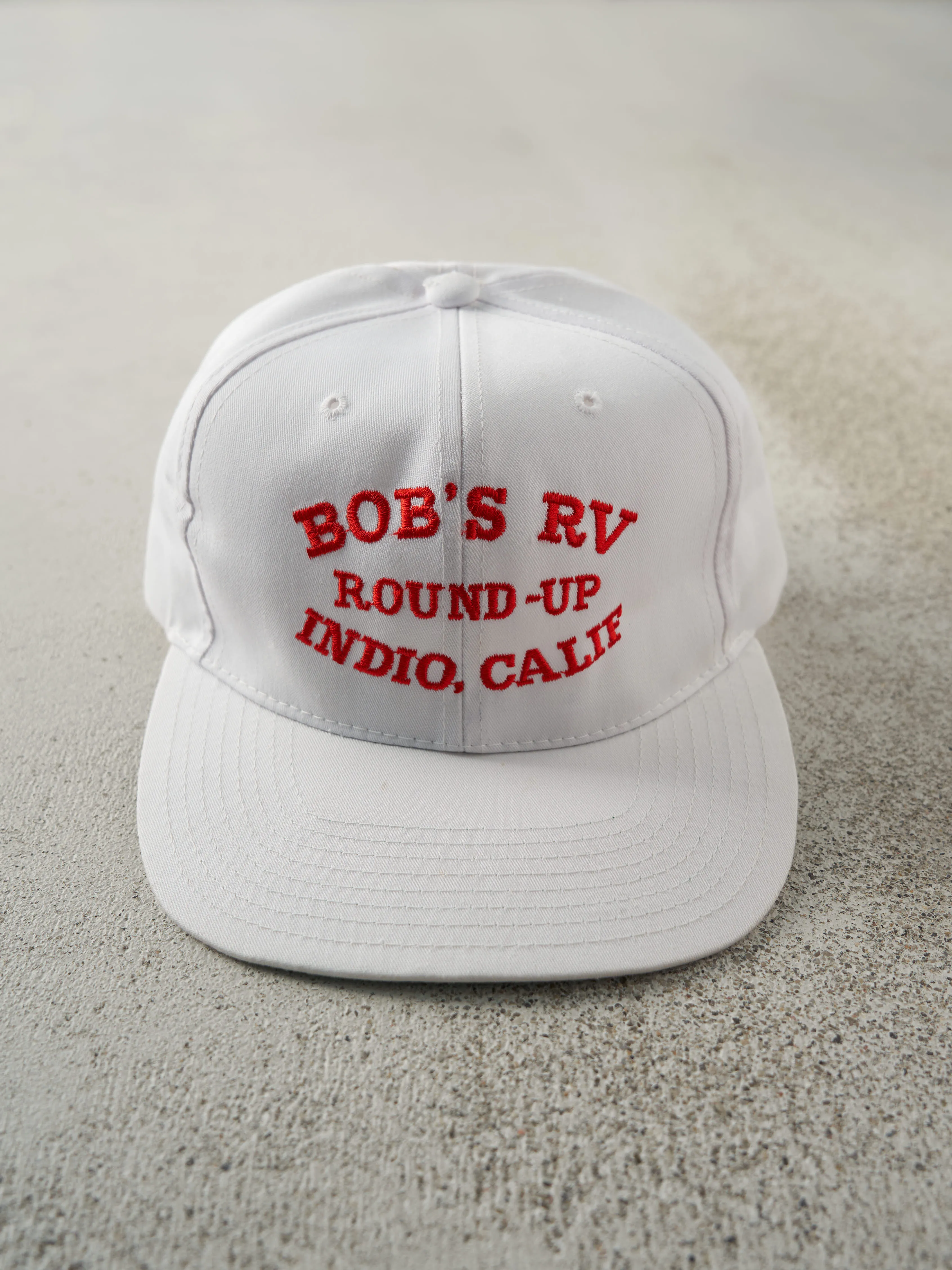 Vintage 90s White Bob's RV Round Up Indio, Calif Embroidered Snapback sold by Rebalance Vintage