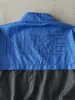 Vintage 90s Blue & Black Nike Windbreaker Jacket (XL) sold by Rebalance Vintage