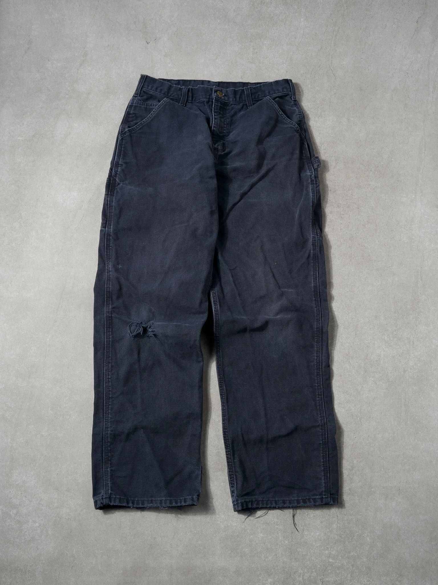 Vintage 90s Washed Navy Carhartt Original Dungeree Fit Carpenter Pants (34x31) sold by Rebalance Vintage