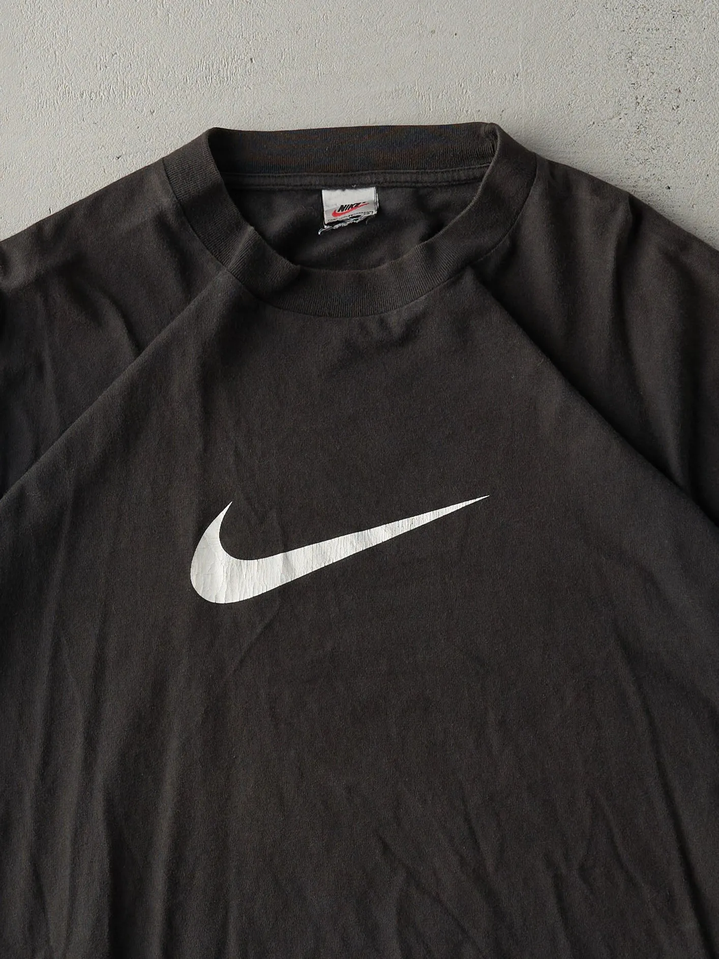 Vintage 90s Black Nike Swoosh Tee (L) sold by Rebalance Vintage product image thumbnail 3