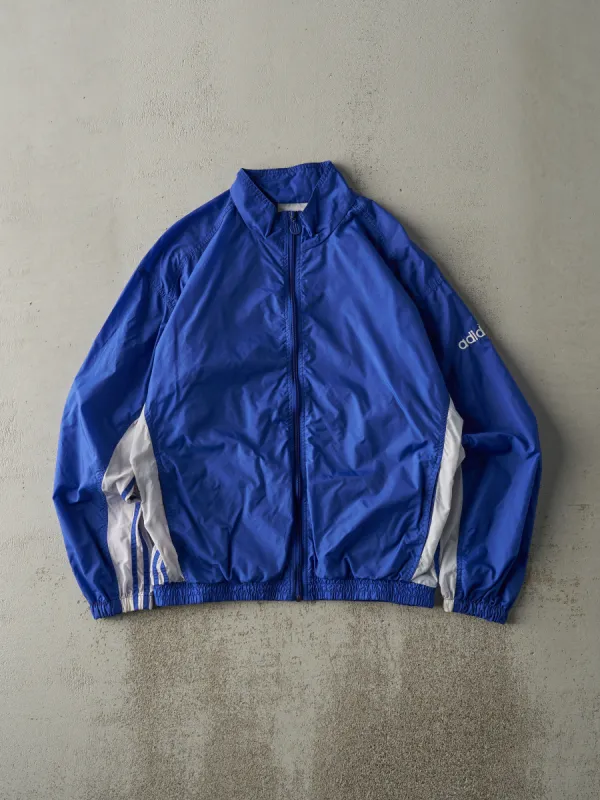 Vintage 90s Blue & White Adidas Windbreaker Jacket (M/L) sold by Rebalance Vintage