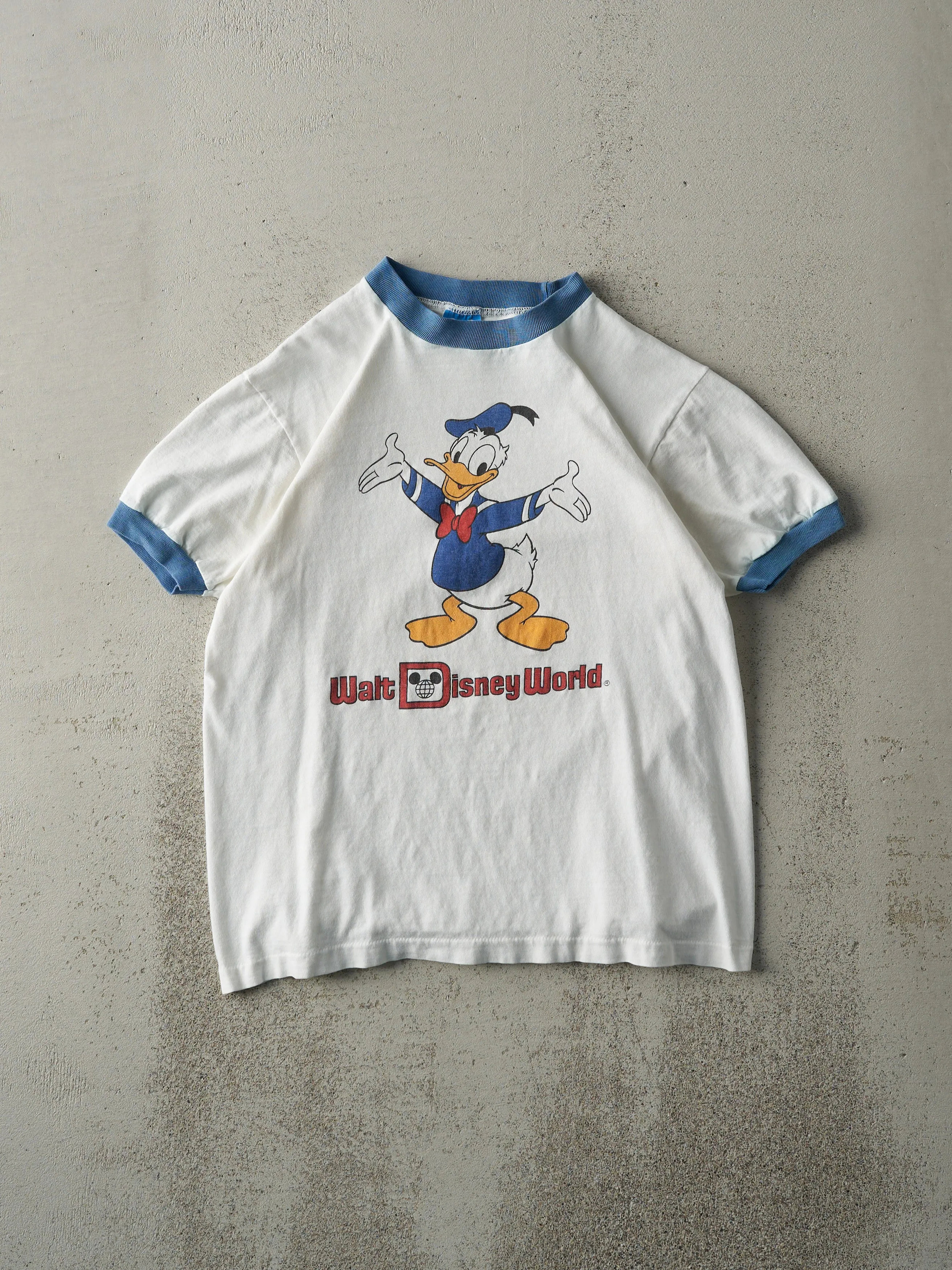 Vintage 90s White Donald Duck Disney Ringer Tee (S) sold by Rebalance Vintage