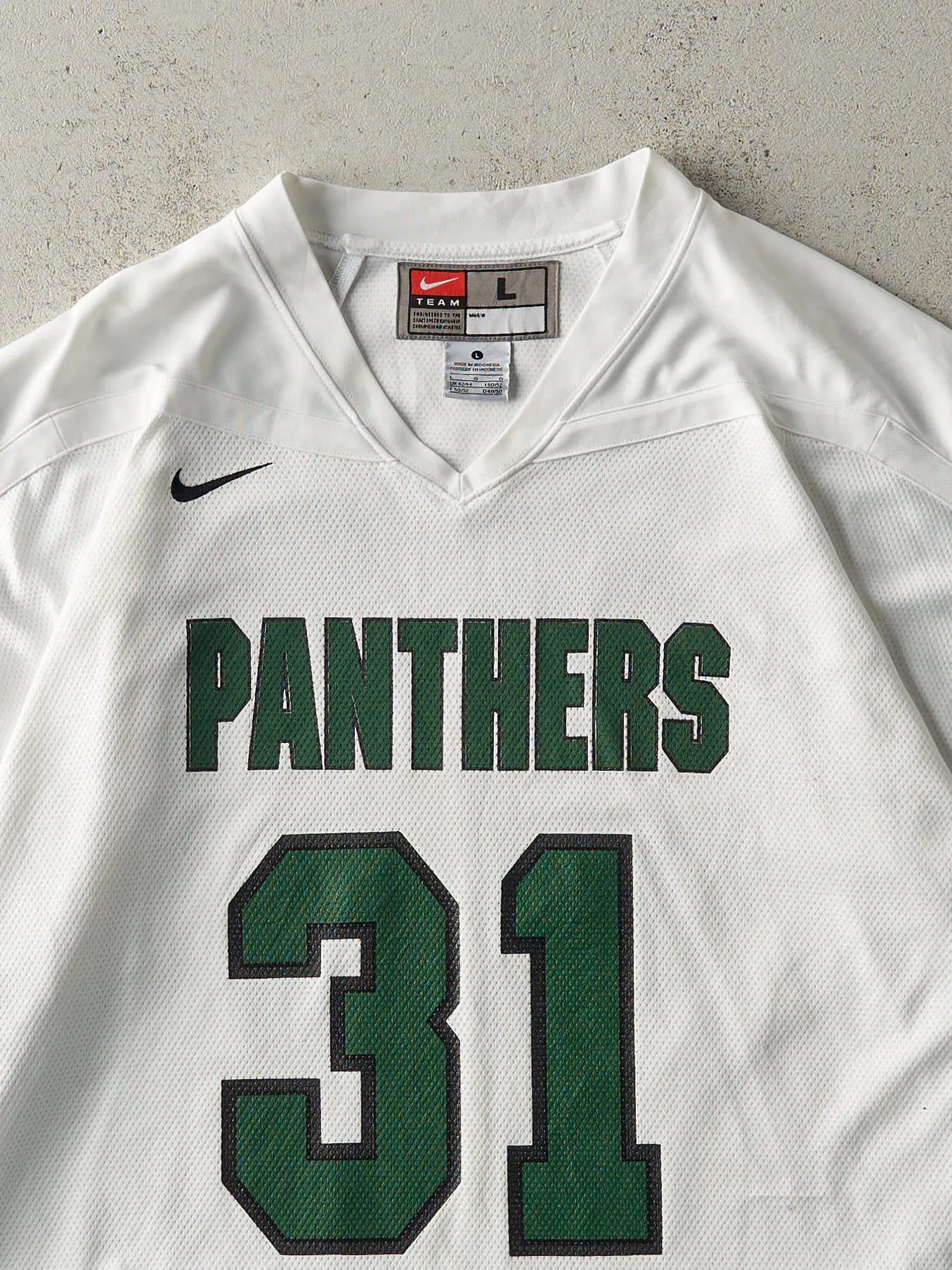 Vintage 90s White & Green Panthers #31 Jersey (L) sold by Rebalance Vintage product image thumbnail 4