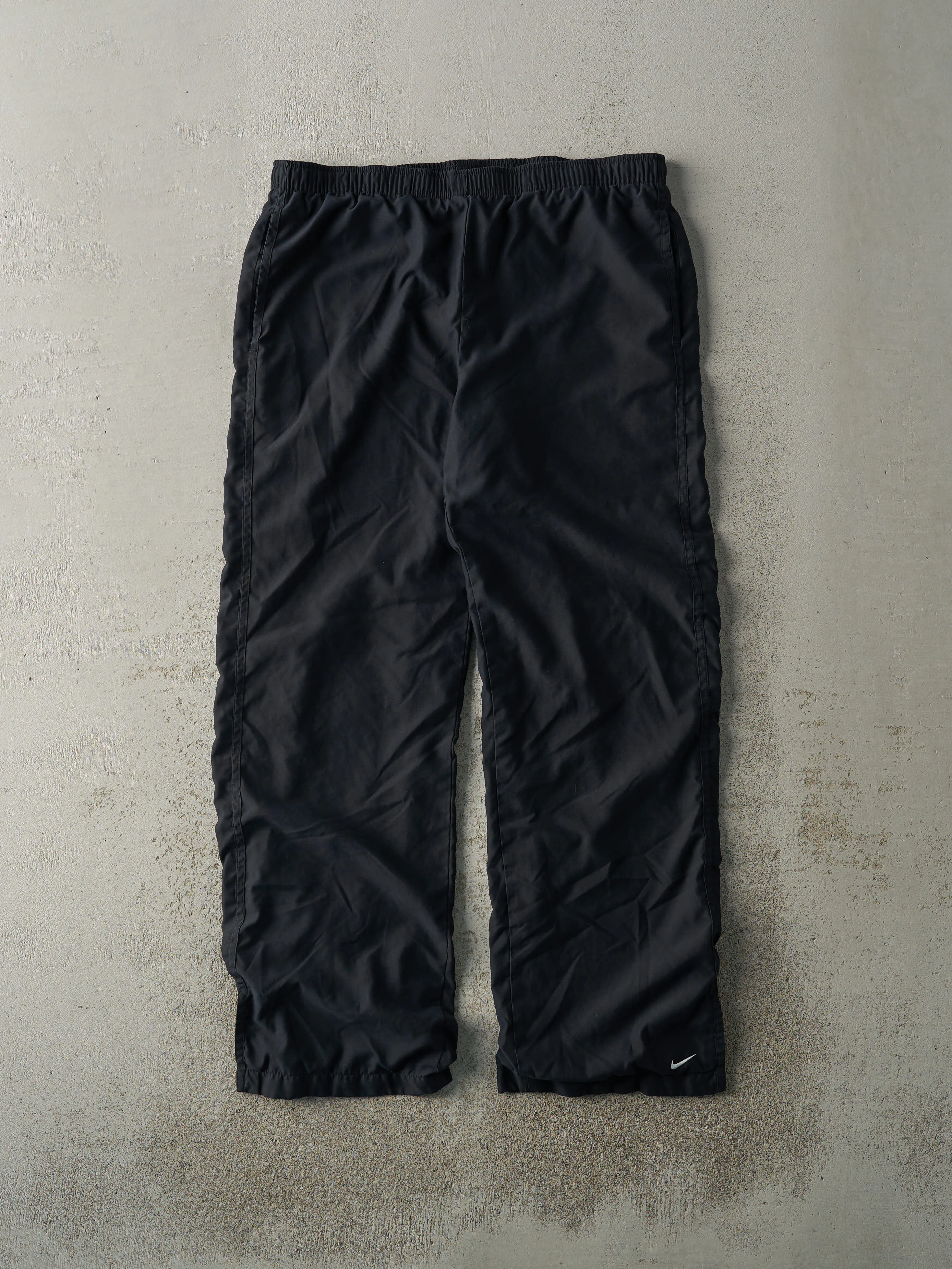 Vintage Y2K Black Nike Track Pants (35.5x29) sold by Rebalance Vintage