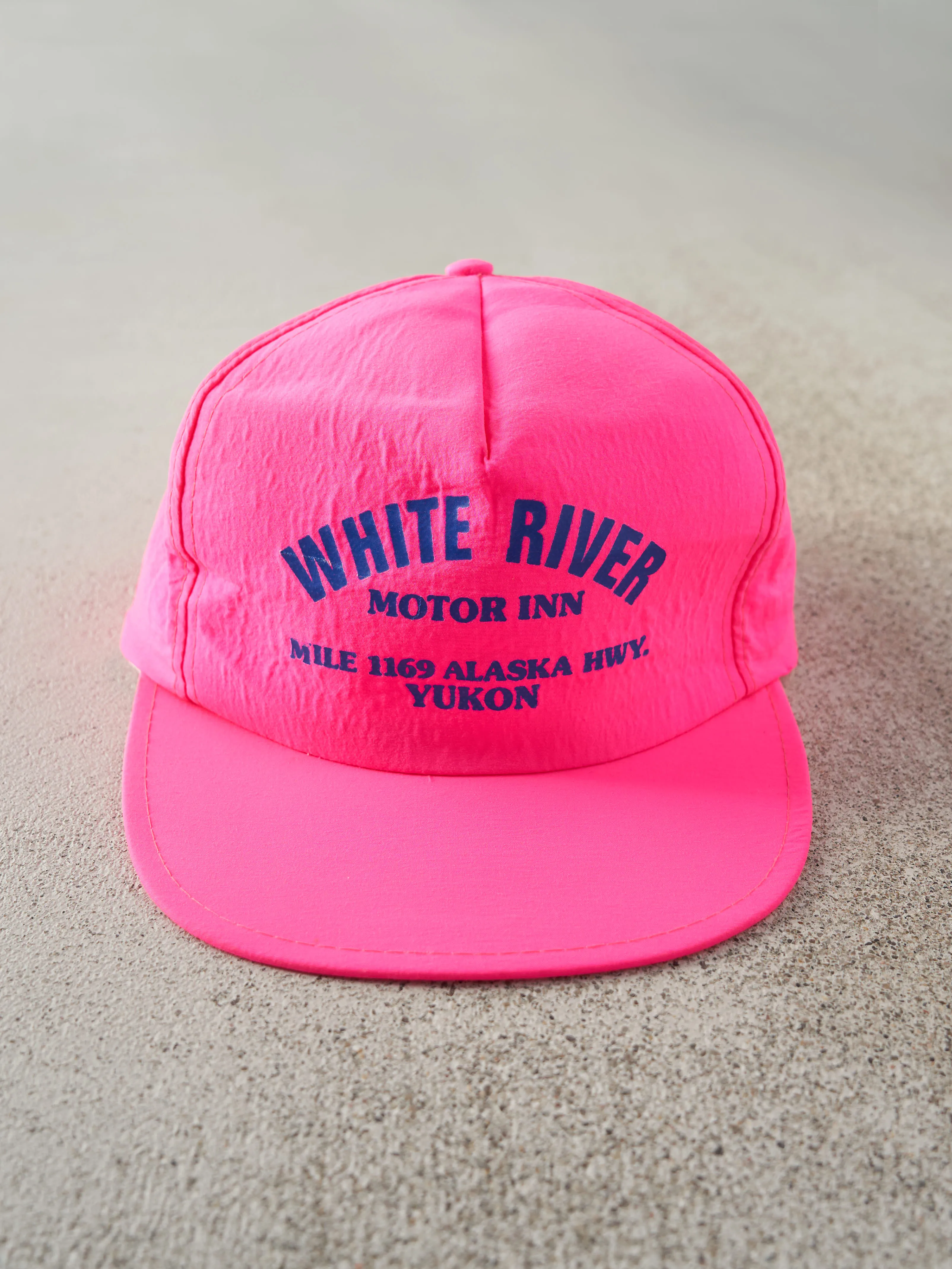 Vintage 80s Neon Pink White River Motor Inn Yukon Nylon Snapback sold by Rebalance Vintage